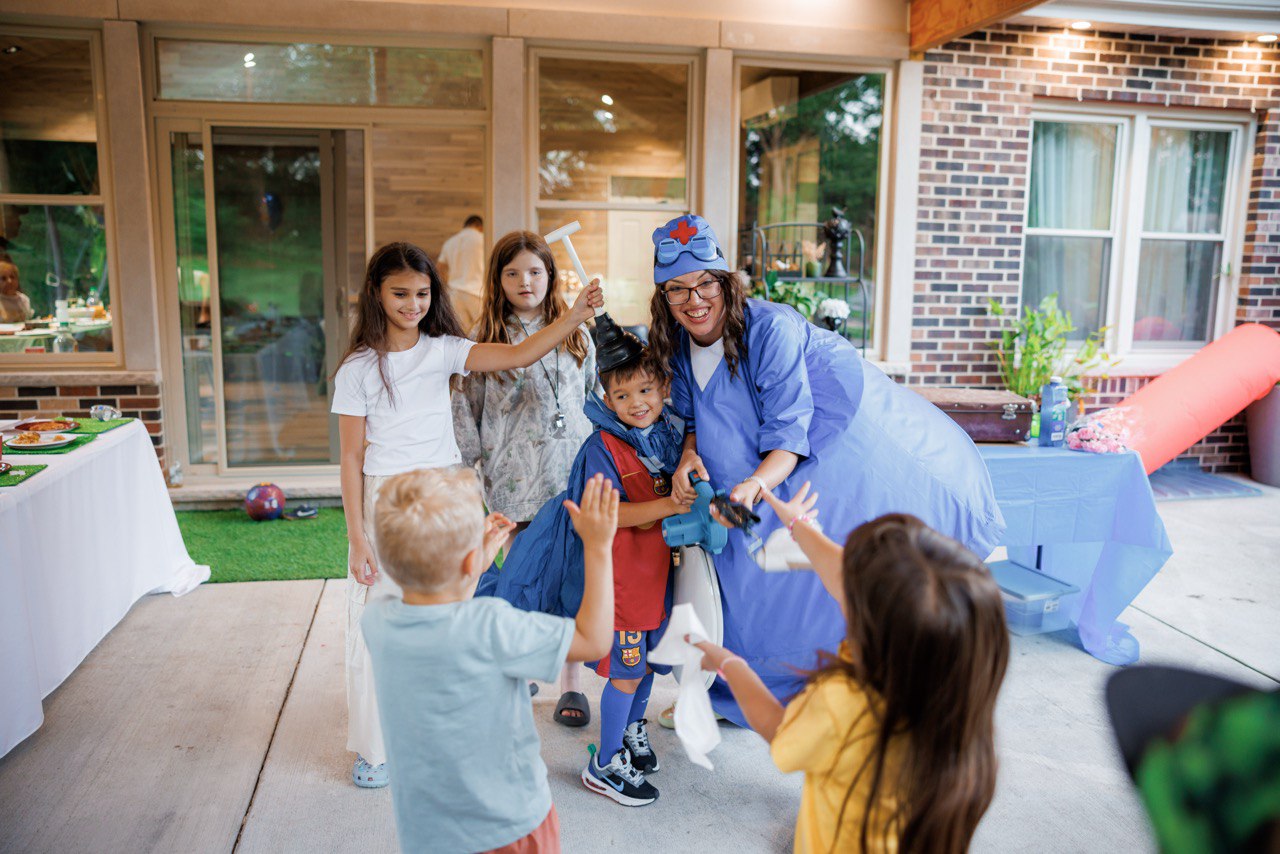 Kids enjoying a fun entertainer at a children's birthday party