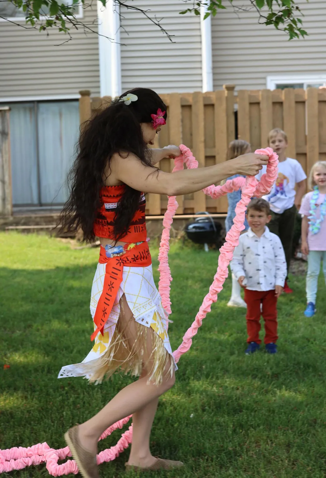 Moana birthday party entertainer leading themed games for kids outdoors