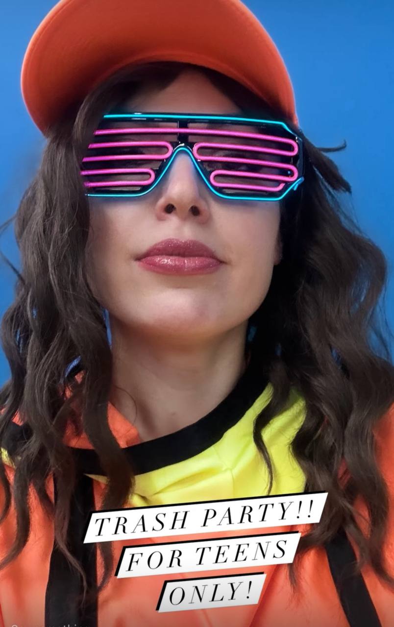 Trash Party entertainers wearing glasses and striking fun pose